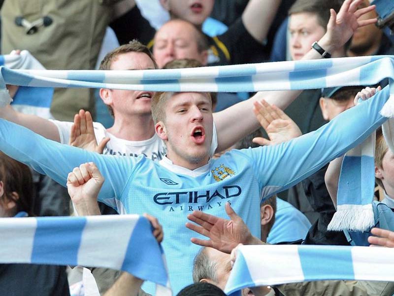 Suporter Manchester City. Foto: Gerry Penny/European Pressphoto Agency Suporter Manchester City. Foto: Gerry Penny/European Pressphoto Agency