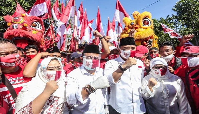 Pasangan Calon Wali Kota dan Wakil Wali Kota Surabaya Nomor 01 Eri Cahyadi dan Armuji. FOTO: Antara Pasangan Calon Wali Kota dan Wakil Wali Kota Surabaya Nomor 01 Eri Cahyadi dan Armuji. FOTO: Antara