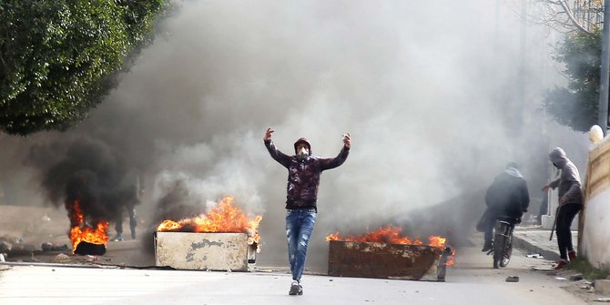 Kerusuhan di Tunisia. Foto: REUTERS/Amine Ben Aziza. Kerusuhan di Tunisia. Foto: REUTERS/Amine Ben Aziza.