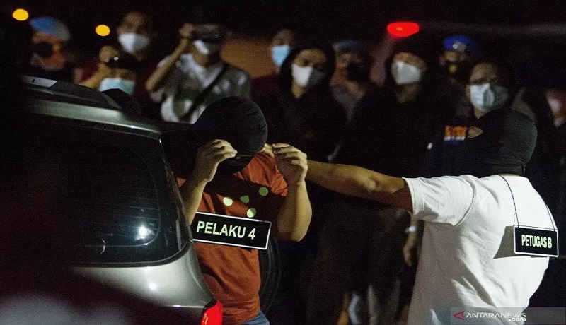 Rekonstruksi kasus penembakan FPI di Tol Jakarta Cikampek KM 50. FOTO: Antara Rekonstruksi kasus penembakan FPI di Tol Jakarta Cikampek KM 50. FOTO: Antara