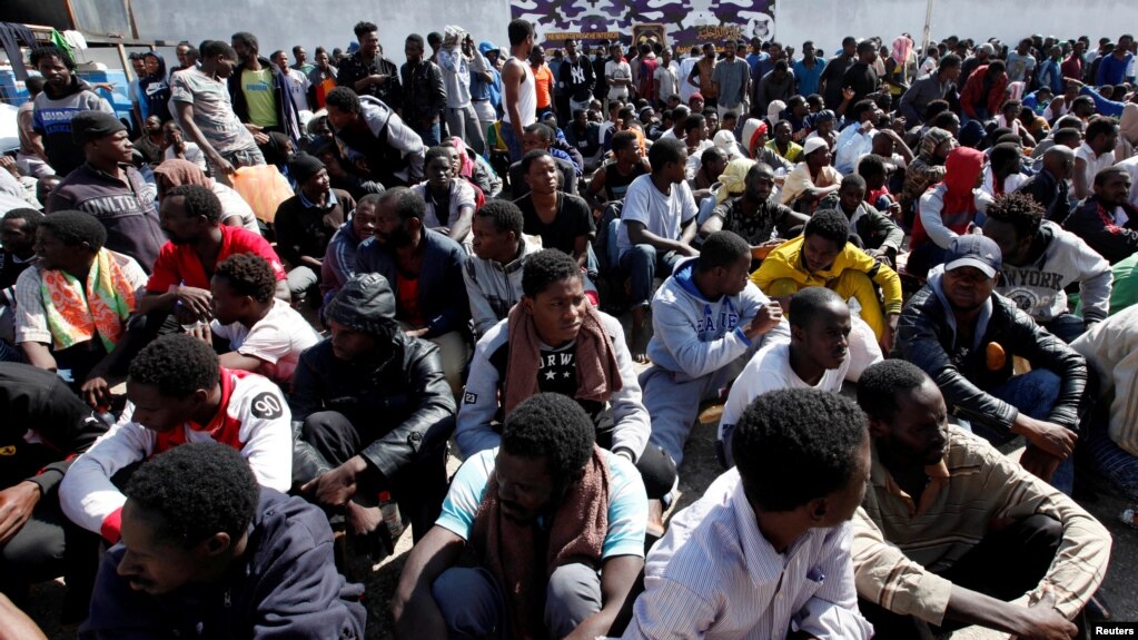 Ilustrasi-Ratusan migran di Libya. Foto: Reuters. Ilustrasi-Ratusan migran di Libya. Foto: Reuters.