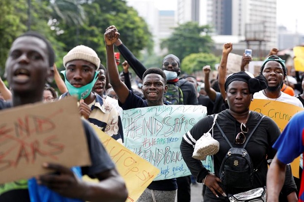 Aksi para demonstran di Nigeria. Foto: Reuters/Temilade Adelaja. Aksi para demonstran di Nigeria. Foto: Reuters/Temilade Adelaja.