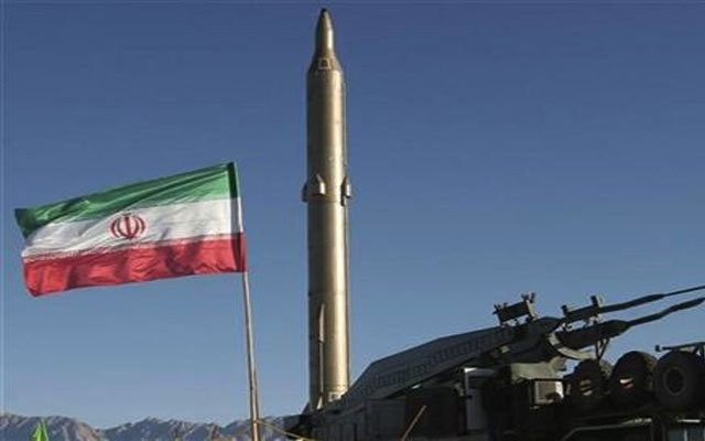 Bendera Iran berkibar dekat rudal saat latihan militer di Iran, 19 Oktober 2020. Foto: Reuters/Wana. Bendera Iran berkibar dekat rudal saat latihan militer di Iran, 19 Oktober 2020. Foto: Reuters/Wana.