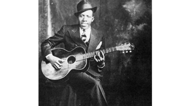 Robert Johnson (sumber foto: Wikipedia) Robert Johnson (sumber foto: Wikipedia)