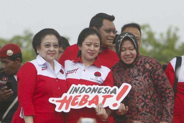 Megawati Soekarnoputri bersama Puan Maharani dan Tri Rismaharini. Foto: ANTARA/M Risyal Hidayat Megawati Soekarnoputri bersama Puan Maharani dan Tri Rismaharini. Foto: ANTARA/M Risyal Hidayat